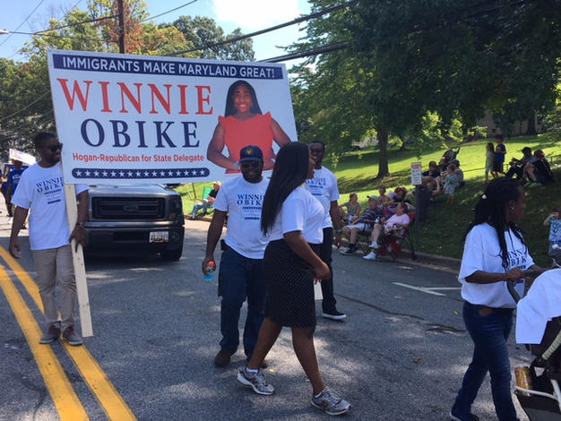 House candidate Obike marches in the parade