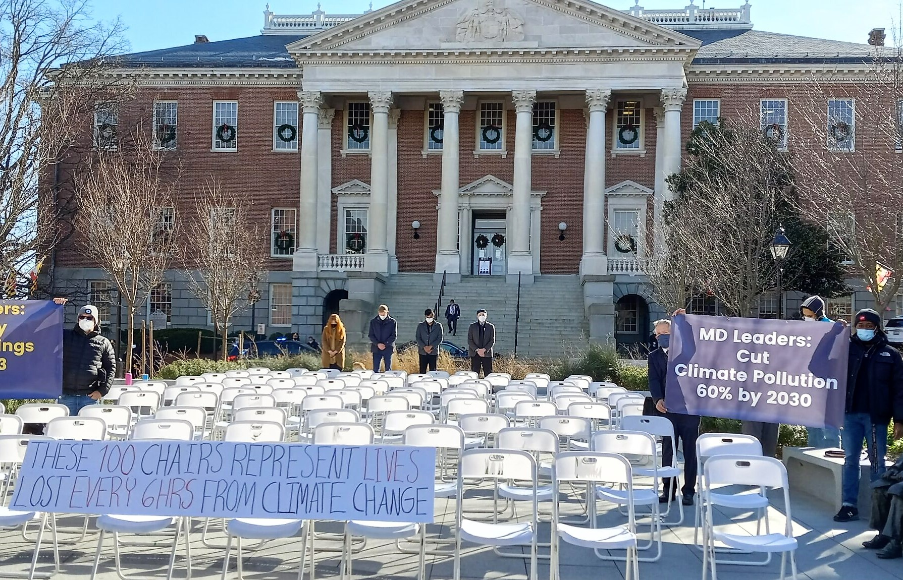 100 empty chairs represent climate change deaths